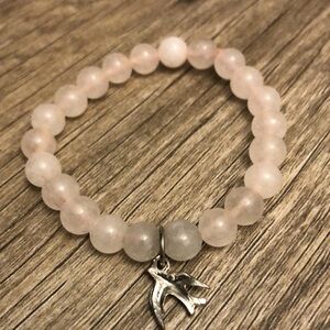 Rose quartz with a Dove